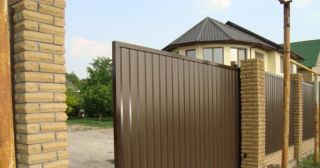 Купить откатные ворота из профнастила Минусинск, цена от 1748 руб.